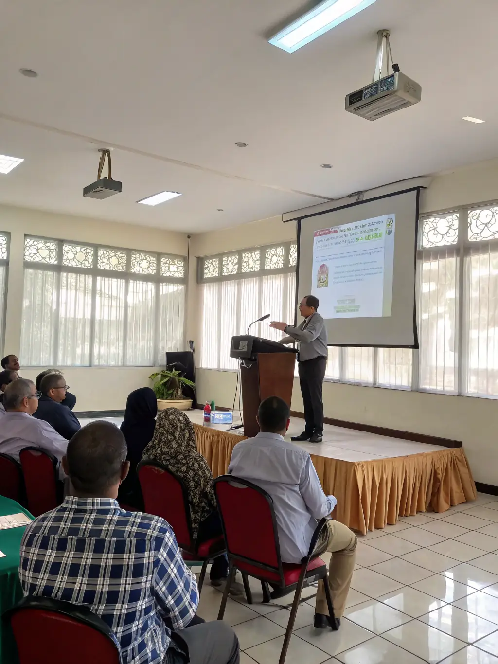An image of a professional individual confidently presenting in a conference room, symbolizing growth and achievement in Professional Growth Coaching.